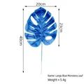 Blue artificial monstera leaf with stem and dimension markings for tropical home decor - Large Style (Matte) / Blue