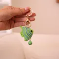 Handgemaakte gehaakte vis sleutelhanger met groene bel voor creatief cadeau - Vis (xmrysk) / Groen