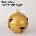 Medium sized decorative gold Christmas bell ornament featuring star-shaped cutouts - Star Style Medium Gold