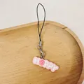 Cute pink resin 'HAPPY' charm phone strap with smiley face icon - 3.5x1.1cm / HAPPY