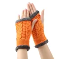 Thick orange cable knit fingerless gloves featuring soft gray plush faux fur lining trim. - One Size / Orange