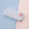 Minimalist grey pencil box with strawberry bunny charm on dual-tone background. - Strawberry Rabbit