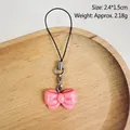 Cute pink resin bow-knot phone strap charm, measures 2.4x1.5cm and weighs 2.18g - Bow
