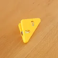 Bright yellow plastic triangle corner clip for organizing school papers and stationery. - Yellow