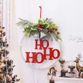 Festive Christmas door wreath hanging with LED lights and red HO HO HO letters decoration - HOHOHO