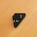 Durable black triangular plastic corner clip for school document and office organization - Black