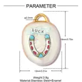 Technical drawing of horseshoe luck charm pendant in stainless steel and enamel - White Oval Style (YK226)