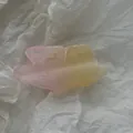 Detailed view of translucent pink and yellow gradient frangipani flower hair claw clip - Smudged 3D Butterfly