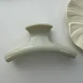 Detailed side view showing the smooth glossy finish of this large cream hair claw shark clip - Water Pipe Style / 12cm / Cyan Wood