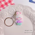 Adorable cartoon white rabbit figurine keychain with pink and teal outfit bag charm - Rabbit / Purple
