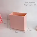 Compact pink wall-mounted stationery storage box, dimensions 10x9x5cm, durable plastic. - Pink