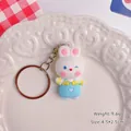 Cute cartoon white rabbit keychain charm with blue overalls, weight 9.6g and size 4.5cm - Rabbit / Light Blue