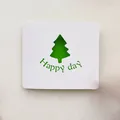 Minimalist white greeting card featuring a green hollow Christmas tree cutout design - Green Pine