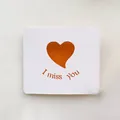 Minimalist creative hollow heart greeting card featuring orange 'I miss you' typography - Red Heart