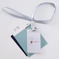 Minimalist clear ID badge holder with white lanyard and broken heart graphic - Heartbroken
