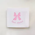 Elegant white holiday greeting card featuring a pink hollow bow and Best Wishes pink text - Pink Bowknot