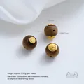 24K vergulde agarhout kralen met boeddhistische symbolen voor DIY sieraden maken. - Oneindige Boeddha Dubbelzijdig Agarhout (A123-1) / 1 Stuk