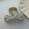 Minimalist light grey PC hair claw clip with gold spring for elegant styling. - Hollow Bow Tie Style / 8.5cm / Cyan Wood