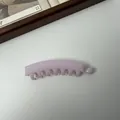 Elegante macaronroze bananenhaarklem met tanden voor een stevige grip op de paardenstaart - 10cm Grootte / Roze