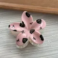 Macro detail of macaron pink flower hair claw clip with heart and bow patterns - Flower / M / Pink