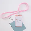 Cute pink cartoon ID card holder with matching lanyard for student or office use. - Blowing Bubbles