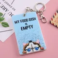 Simpatico porta tessere in acrilico azzurro con gatto e slogan My Food Dish Is Empty - Gatto Persiano