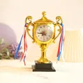 Creative golden trophy shaped student bedside alarm clock with decorative ribbons - Gold