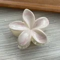 Detailed close-up of a floral hair claw clip with pink bow prints on a white base - Flower / M / Pink White