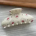 Macro view of cream hair claw clip featuring heart and cherry patterns with pink bows - Ingot Shape / L / Cream White Heart