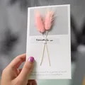 Handmade greeting card featuring pink dried bunny tail flowers and elegant English text - Lagurus (Pink)