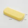 Estuche escolar amarillo de plástico, con dimensiones de 21,6 x 7,2 x 3 cm - Rectángulo / Amarillo