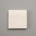 Minimalist cream-colored square sticky note pad with black grid pattern for notes - Grid