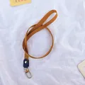 Minimalist caramel brown lanyard with gold metal clasp for ID badges and card holders - Solid Color / Brown