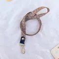 Patterned lanyard with gold metal hook and leather connector for ID card holder - Rainbow / Khaki