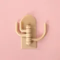 Cute beige cactus-shaped wall hook with three rotating branches and adhesive back - Brown