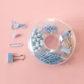 Light blue stationery set with binder clips and push pins in a round plastic box - Blue
