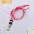 Stylish red and white patterned neck lanyard with gold metal clasp for ID card holders - Rainbow / Rose Red