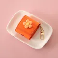 Vibrant orange flower protective case for AirPods 2, 3, and Pro with golden keychain. - Orange Flower - For AirPods 1/2 / Orange
