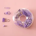 Purple office stationery set with binder clips and pins in a clear circular storage box. - Purple