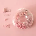 Set di cancelleria rosa con fermagli e puntine in un organizer rotondo e trasparente - Rosa