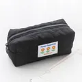 Stylish black quilted heart-pattern pencil case featuring a decorative floral happiness patch - Heart Quilted Style / Black Pongee
