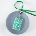 Floral pattern ID badge holder with retractable reel and matching green neck lanyard - 7 Envelope and Bird