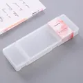 Minimalist frosted PP plastic pencil box with pink watercolor sleeve on a clean desk - Divided Style / Clear White