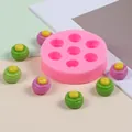 Pink circular silicone mold with 7 cavities for mini DIY desserts and candies - Pink