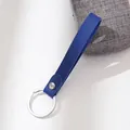 Royal blue leather strap keychain with silver ring and metallic stud detail accessory - Blue