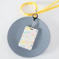 Portatarjetas con diseño floral, cordón amarillo retráctil y clip de cara sonriente - 1 Conejito