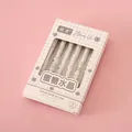 Set of 6 aesthetic retractable gel pens with quick-dry ink in a pink grid box packaging. - 0.5mm / Honey Crystal