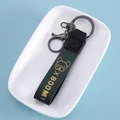Dark green leather keychain strap with golden French Bulldog icon and XBOOM text print - Green Dog / Green