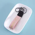 Pink leather strap keychain with gold Frenchie dog logo and metallic gunmetal ring - Pink Dog / Pink