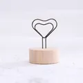Vintage heart-shaped wire photo clip with natural wood base for home office decor. - Heart